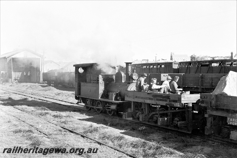 P19888
H class 18 hauling stone train for the construction of Bunbury breakwater. Rear view of locomotive. SWR line.
