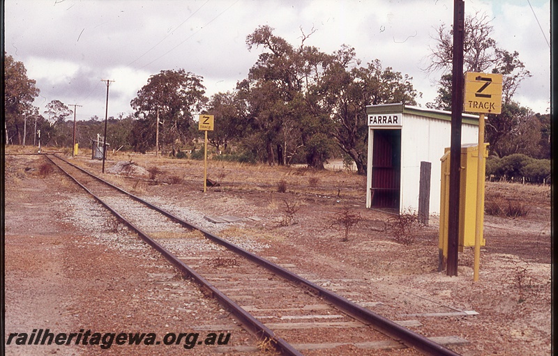 P19964
Station shed, with station nameboard, Z track signs, level crossing, track, Farrar, DK line

