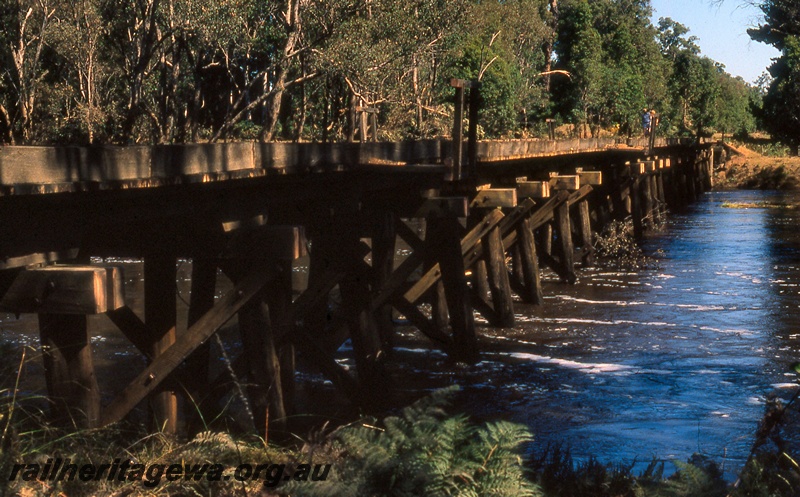 P19976
Bridge, wooden trestle, Blackwood River, Nannup, WN line, view from bank
