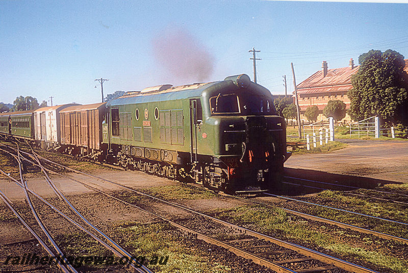 P20420
XA class 1408 in all green livery departs Midland Junction hauling a passenger train.   ER line.
