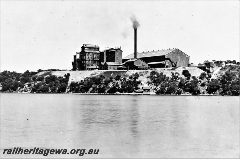 P21490
3 of 3 views of the Colonial Sugar Refineries plant at the end of the Rocky Bay line in Mosman Park, view from across the river of the refinery in operation, four wheel van on a short trestle

