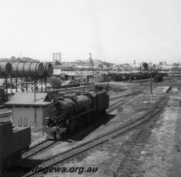 P21849
Loco depot, V class loco, fuel tanks, buildings, points, shed, East Perth, ER line, view from elevated position
