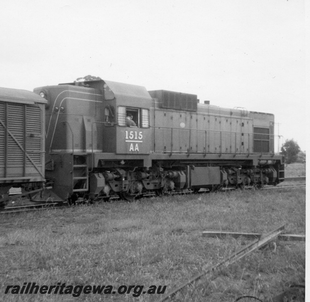 P21855
AA class 1515, on westbound goods train, part louvre van, Hines Hill, EGR line, end and side view 
