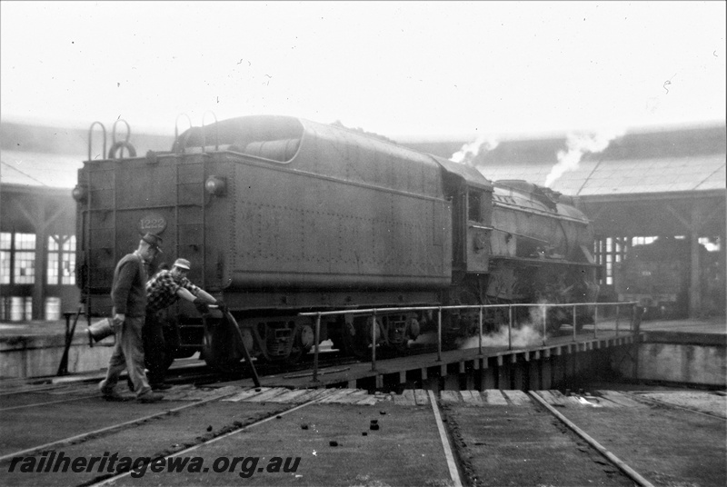 P21866 
V class 1222, on turntable, another steam loco, roundhouse, workers, loco depot at Bunbury, SWR line, rear and side view
