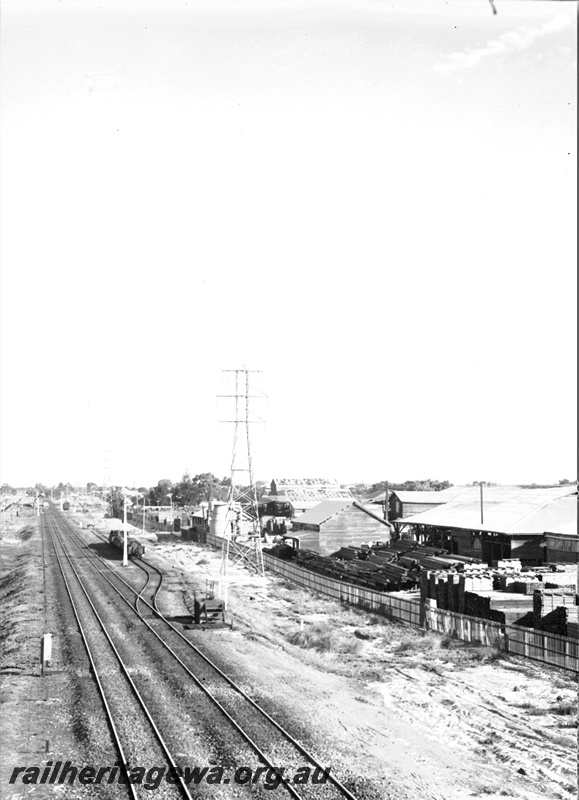 P21925
Tracks, siding, signal, timber yard, power pylon,  near Victoria Park, SWR line, view from elevated position 
