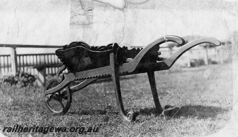 P21951
Ceremonial wheelbarrow in an outdoor setting, Inscription on the rear of the photo states 