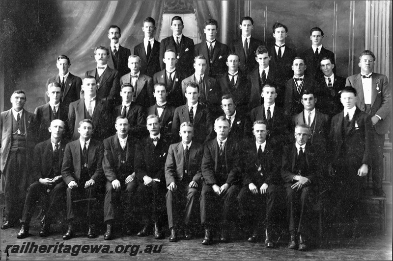 P21952
Group photo of Fremantle Railway Ambulance Class of 1924. Front row: J. Finnucane, P. Harrison (Chair 1922), W.A. Restieaux (Chair 1923-4, Instructor 1924), Dr M. Glanville (Lecturer 1923-4), T.R. Woodroffe (Secretary 1922-4), T.E. Ryan (Instructor 1921-3), G.W. Fruin (Instructor 1922), F.J. Dodds. Second row: R. Watson, D. McGowan, E.M. Renner, E. Morris, E.W. Varcoe, J. Haynes, A.H. Sherville, H. MacLiver, F.A. Andrews, J. Noble. Third row: J. Affleck, J. Knox-Peden, G.A. Coad, O.W. Willshire, T. Priestly, N. Taylor, J. McCarthy, J. Sheedy, W. Woods, A. G. Cotton. Back row: W. Foord, N.A. Fowler, J.W. Woolmington, A.D. Saunders, A.C. Foord, C.A, Edwards, L. McEwen.
