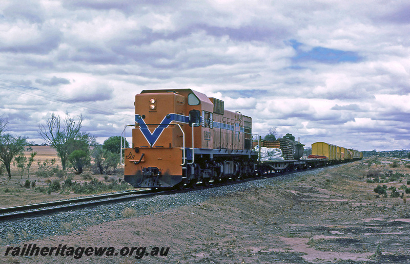 P21970
A class 1507, on goods train, Neeralin Pool, GSR line, front and side view 
