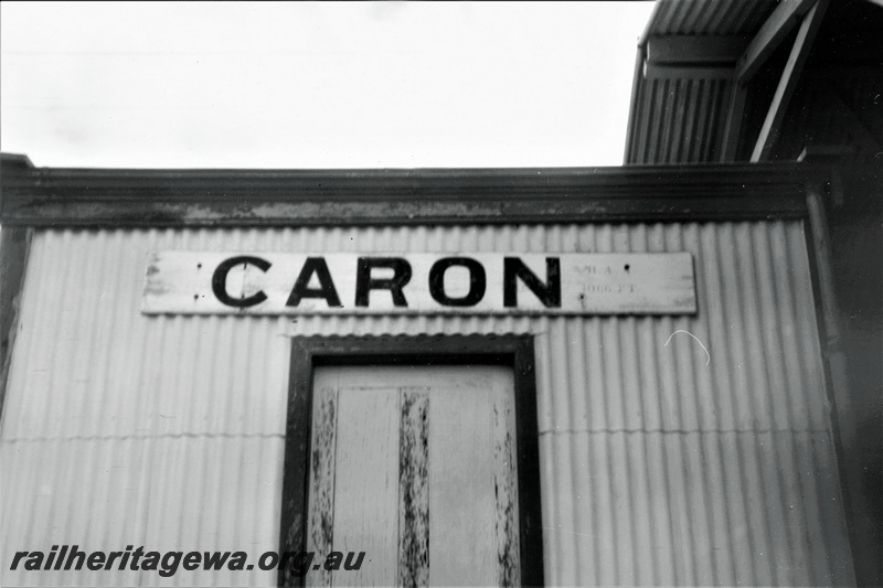 P21999
Nameboard, Caron, EM line, mounted above the door of the Out of Shed
