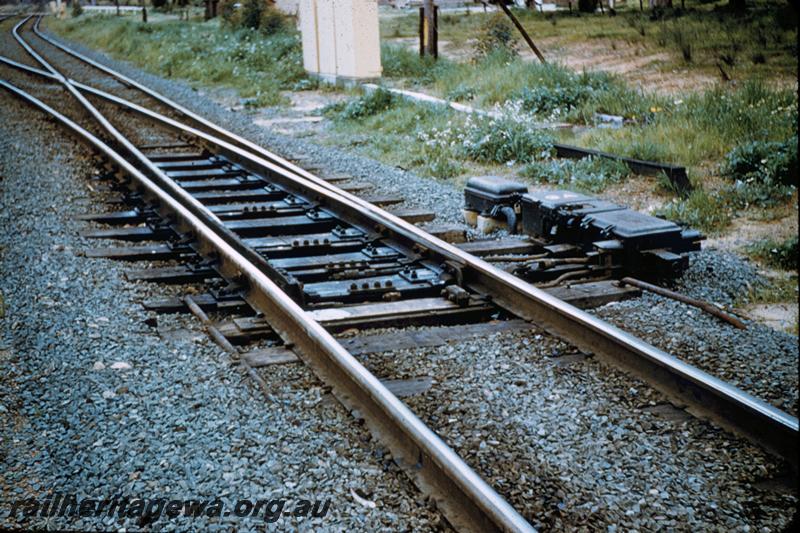 T00128
Trackwork, point motor, location Unknown
