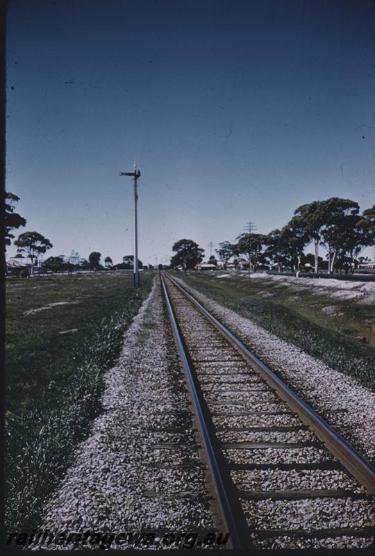 T01401
Track newly ballasted, distant signal with red and white arm
