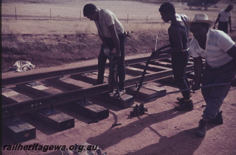 T01875
Standard Gauge Construction, Track layers at work.
