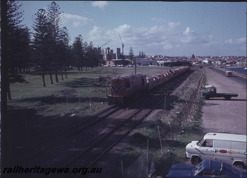 T03979
RA class, Fremantle, train of tarpaulined wagons
