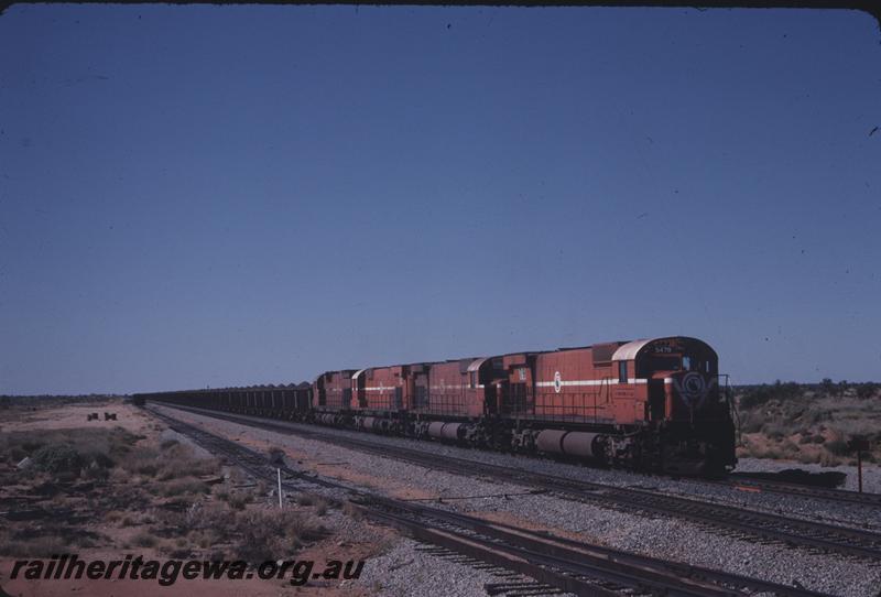 T04081
Mount Newman Mining Alco loco M636 class 5479, leads 2 more M636 class 5484, 5470 and C636 class 5459, loaded train, Abydos Siding, BHP line
