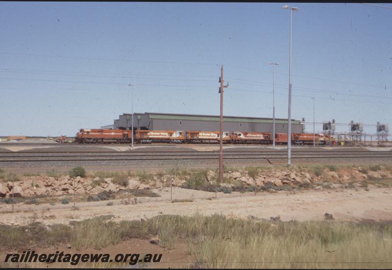 T04085
Mount Newman Mining, Nelson Point Running Shed, Alco and GE locos, Locotrol car, sanding towers, Port Hedland

