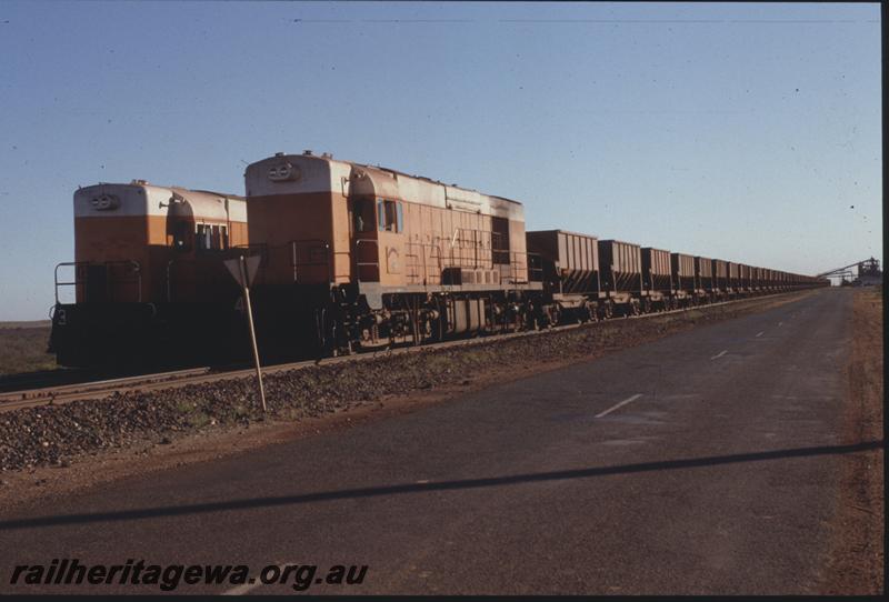 T04112
Goldsworthy Mining Limited English Electric locos A class 4 and A class 3 with empty trains at Finucane Island
