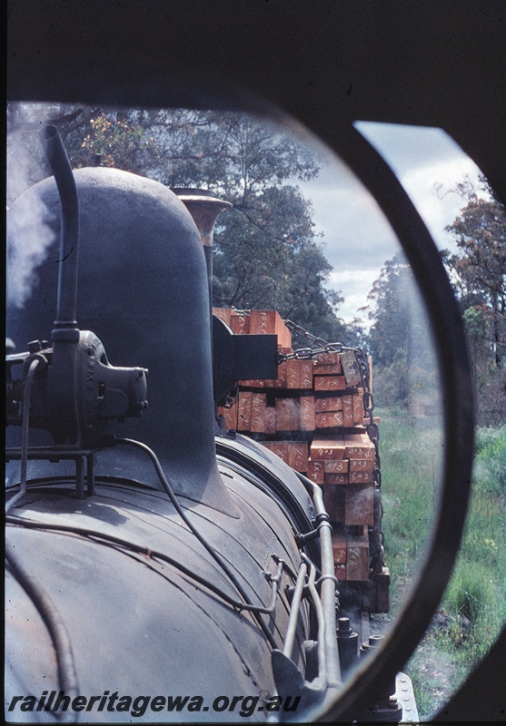 T04539
A view of part of the train of sawn timber seen from the cab of a G class steam locomotive.

