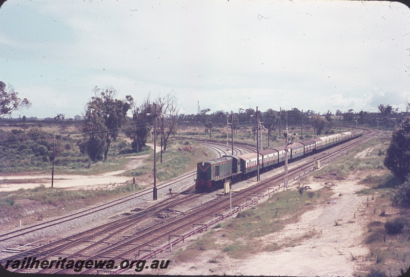 T04596
R class 1902  diesel locomotive hauling an special passenger train travelling towards Kwinana from the Coogee Line
