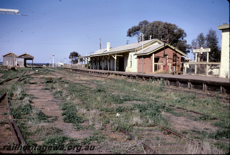 T05012
Station and yard, goods shed, signals, station building and sign, platform, points and sidings, Southern Cross, EGR line, view looking east
