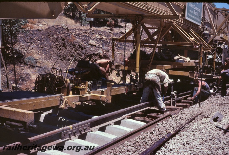 T05024
Track renewal, track laying machine, workers, in cutting, Kalgoorlie to Kwinana Rehabilitation Project
