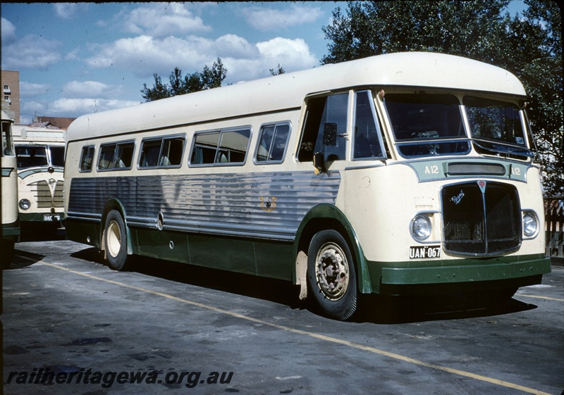 T05028
Railway road service bus A12, licence no UAN 067, black swan crest on side, side and front view 
