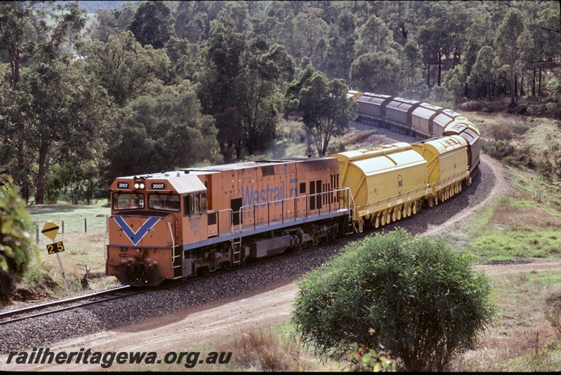 T05274
3 of 3 views of Westrail P class P2007 diesel loco in the orange livery with the blue stripe hauling a coal train made up with XY class hoppers, rounding a curve passing through Olive Hill, BN line, 
