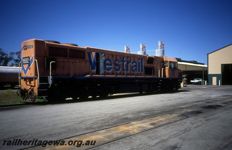 T05400
DB class 1592 in Westrail orange livery with blue and white chevrons on ends and 
