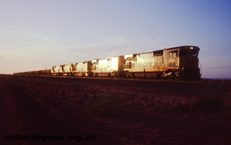 T05800
Five Hamersley Iron locos on an iron ore train, Leading loco is No. 3010, view along the train
