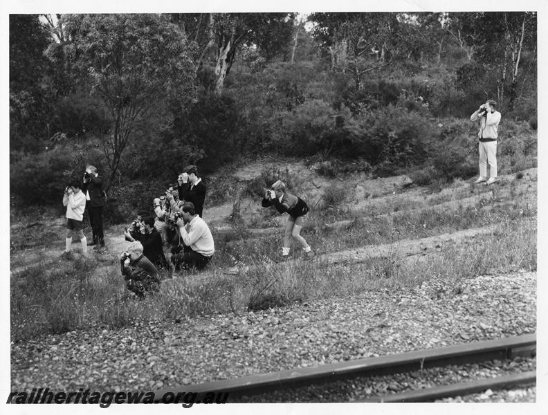 P00030
Rail enthusiasts in a photo line on an ARHS tour train
