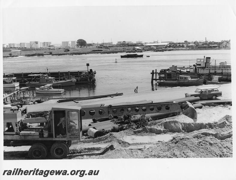 P00038
1 of 98 images showing views and aspects of the construction of the steel girder bridge with concrete pylons across the Swan River at North Fremantle.
