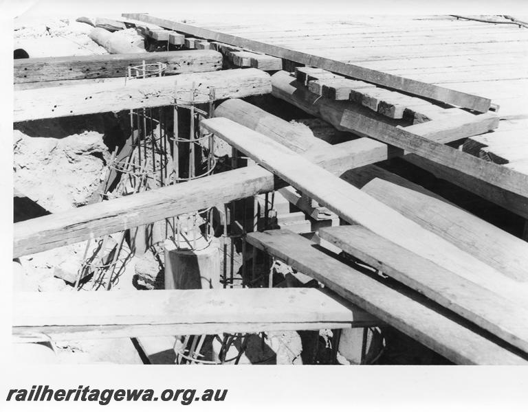 P00040
3 of 98 images showing views and aspects of the construction of the steel girder bridge with concrete pylons across the Swan River at North Fremantle.
