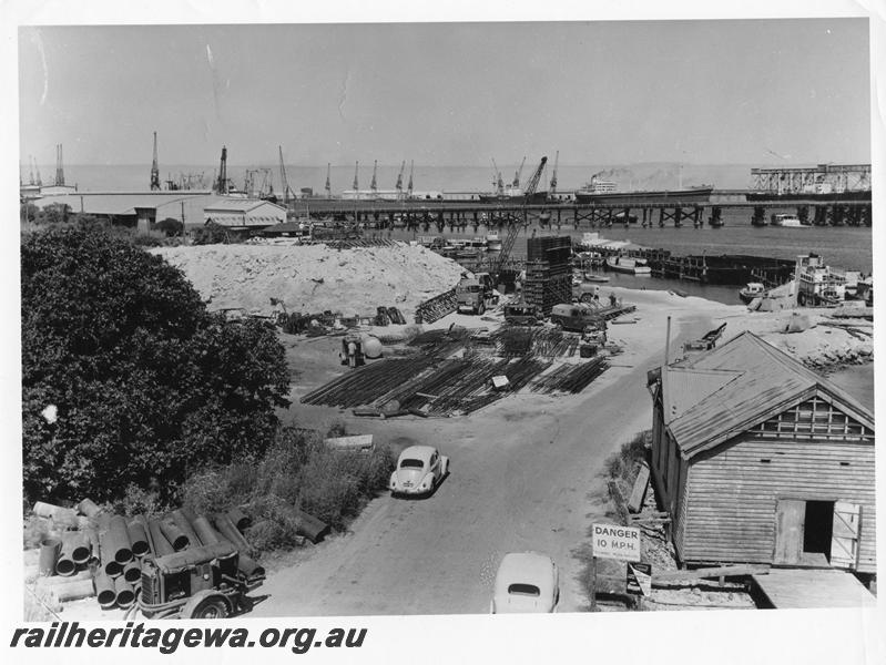 P00051
14 of 98 images showing views and aspects of the construction of the steel girder bridge with concrete pylons across the Swan River at North Fremantle.
