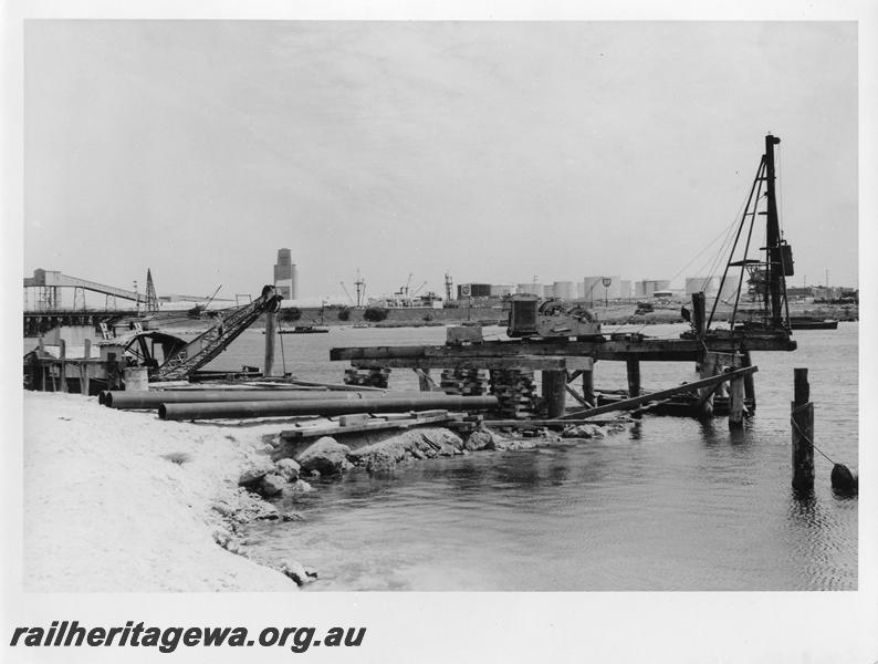 P00058
21 of 98 images showing views and aspects of the construction of the steel girder bridge with concrete pylons across the Swan River at North Fremantle.
