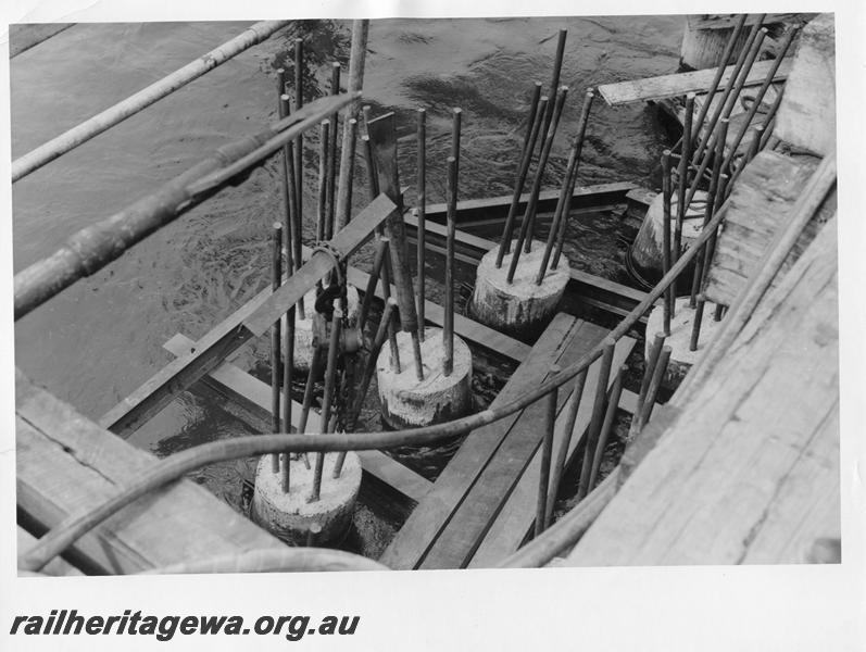 P00071
34 of 98 images showing views and aspects of the construction of the steel girder bridge with concrete pylons across the Swan River at North Fremantle.
