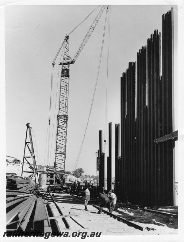 P00073
36 of 98 images showing views and aspects of the construction of the steel girder bridge with concrete pylons across the Swan River at North Fremantle.
