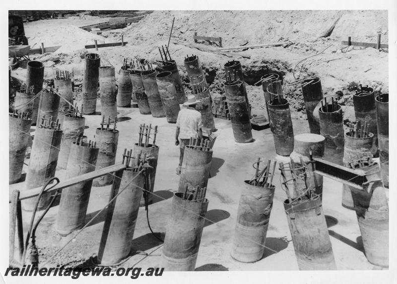 P00075
38 of 98 images showing views and aspects of the construction of the steel girder bridge with concrete pylons across the Swan River at North Fremantle.
