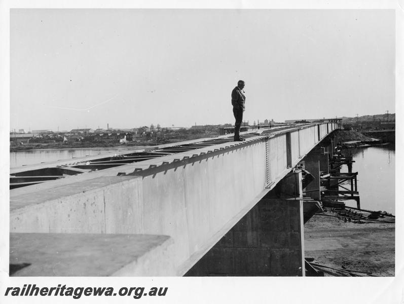 P00080
43 of 98 images showing views and aspects of the construction of the steel girder bridge with concrete pylons across the Swan River at North Fremantle.
