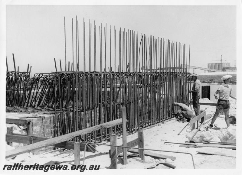 P00092
55 of 98 images showing views and aspects of the construction of the steel girder bridge with concrete pylons across the Swan River at North Fremantle.
