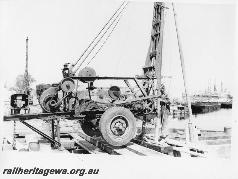 P00098
61 of 98 images showing views and aspects of the construction of the steel girder bridge with concrete pylons across the Swan River at North Fremantle.
