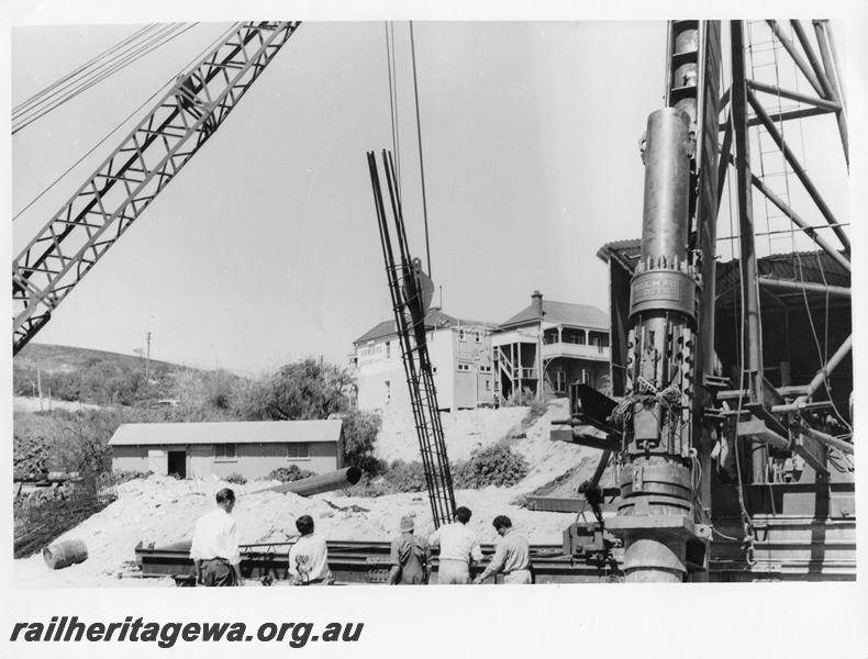 P00100
63 of 98 images showing views and aspects of the construction of the steel girder bridge with concrete pylons across the Swan River at North Fremantle.
