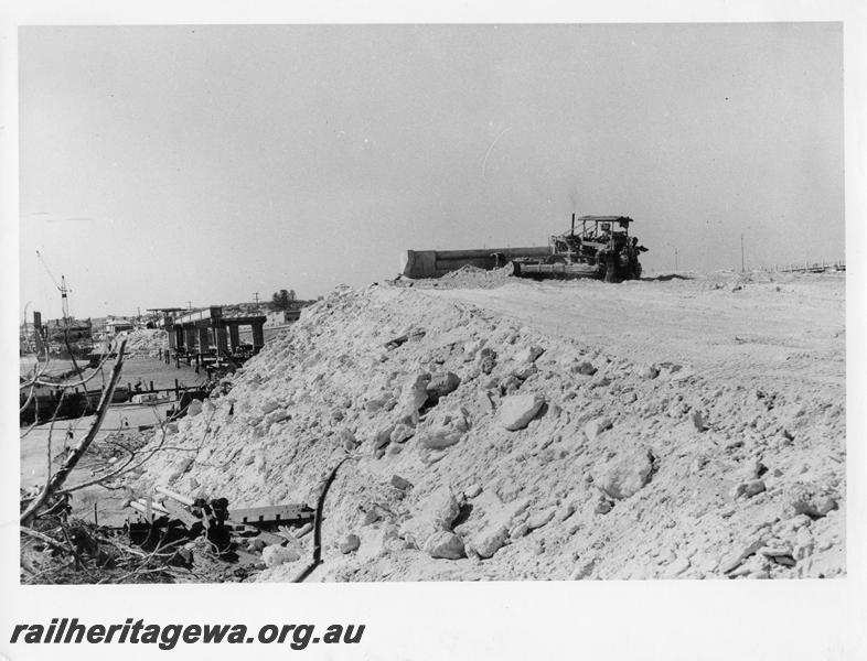 P00101
64 of 98 images showing views and aspects of the construction of the steel girder bridge with concrete pylons across the Swan River at North Fremantle.
