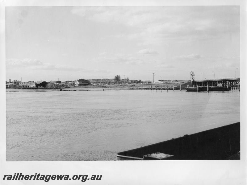 P00113
76 of 98 images showing views and aspects of the construction of the steel girder bridge with concrete pylons across the Swan River at North Fremantle.
