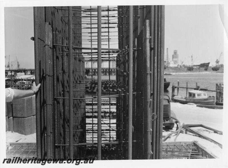 P00120
83 of 98 images showing views and aspects of the construction of the steel girder bridge with concrete pylons across the Swan River at North Fremantle.
