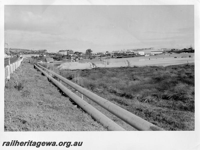 P00127
90 of 98 images showing views and aspects of the construction of the steel girder bridge with concrete pylons across the Swan River at North Fremantle.
