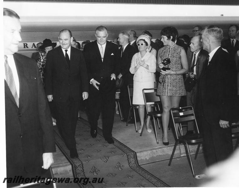 P00152
The Governor General, Sir Paul Hasluck, the Minister for Railways, Charles Court, the ex Commissioner of Railways, Mr. C. G. C. Wayne, at the ceremony celebrating the arrival of the inaugural 
