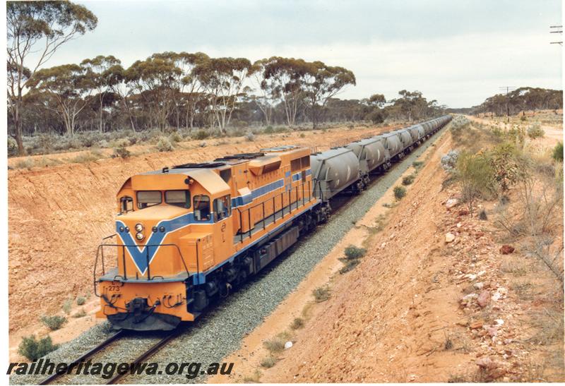 P00237
L class 273 in Westrail orange livery hauling a train of WN class nickel concentrate tankers, front and side view.
