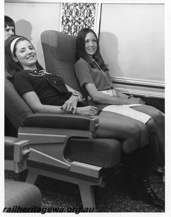 P00257
1 of 7 publicity images of passengers in the Prospector railcar
