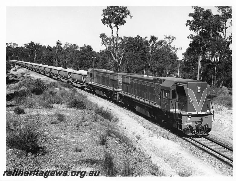 P00273
D class 1562 double heading with another D class hauling a bauxite train, elevated view along the train.
