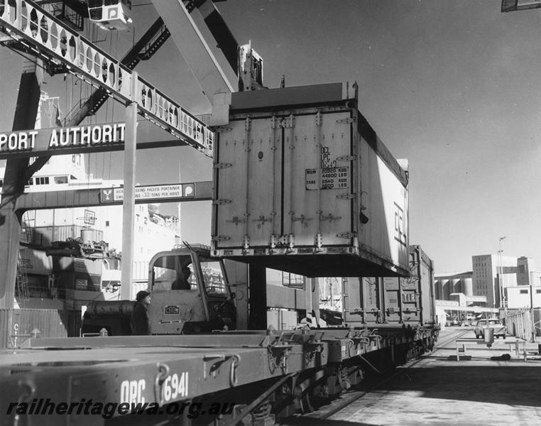 P00289
QRC class 6941, being loaded with a container, Fremantle Harbour, end and side view
