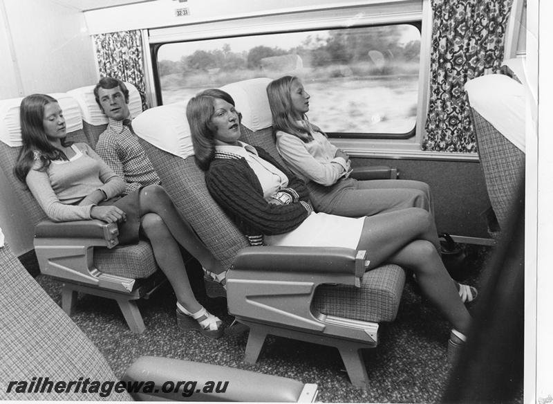 P00291
Prospector railcar, internal view showing seated passengers, publicity photo
